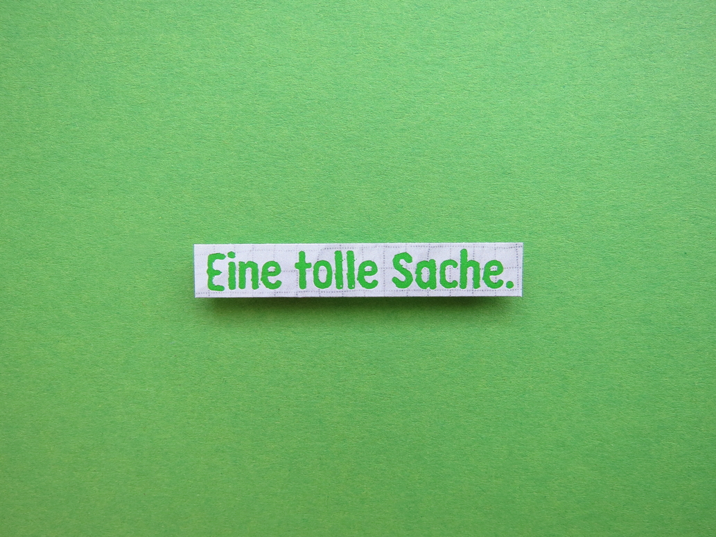 Schriftzug "eine tolle Sache" in grüner Schrift